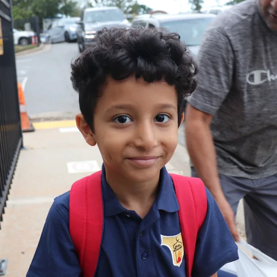 A pupil with a backpack