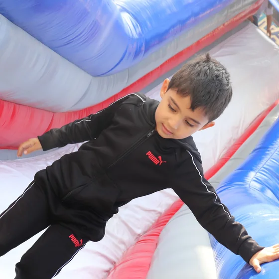 A pupil on the inflatable slide